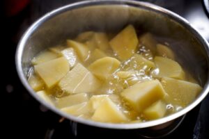 Potatoes boiling in a pot for PA Dutch potato filling.