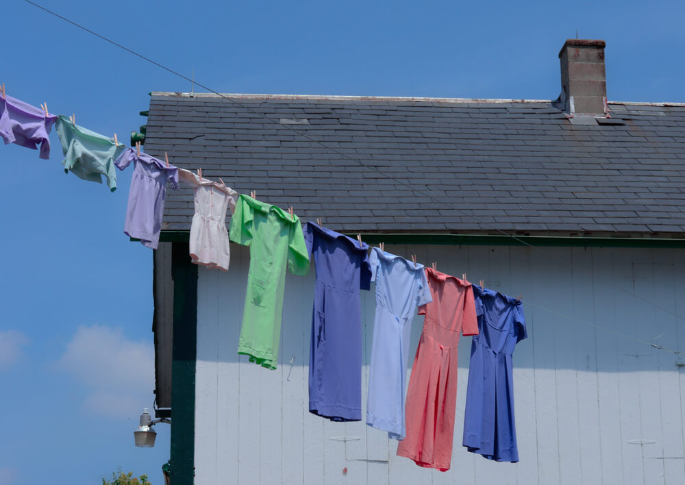 clothing hanging outside to dry on a clothing line